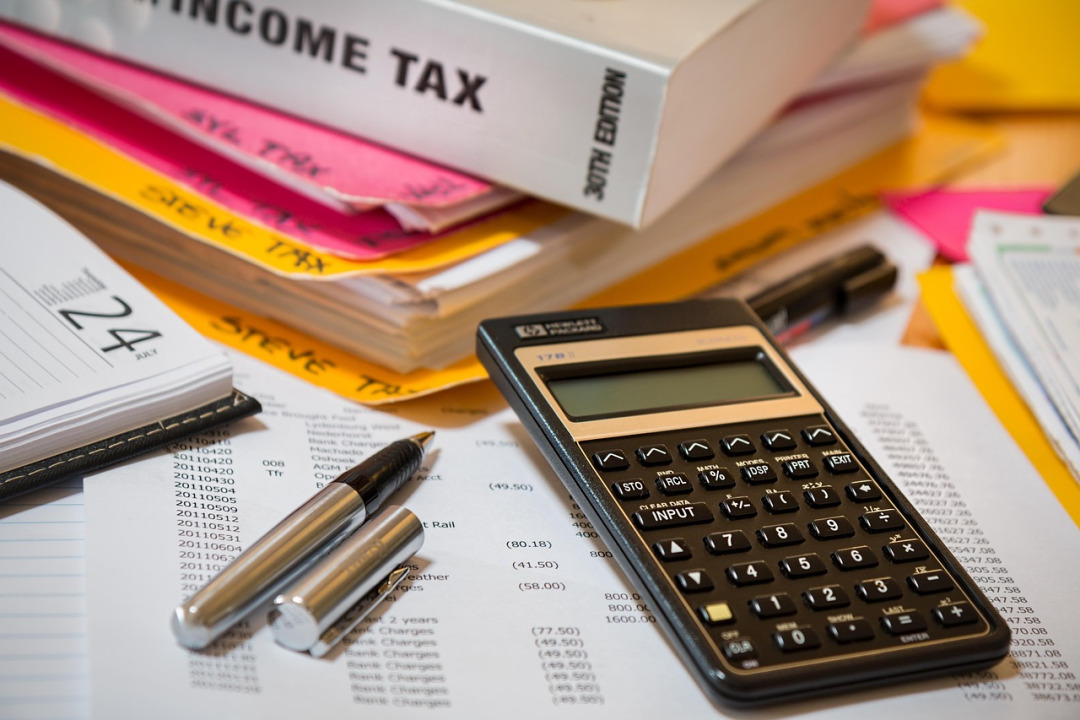 calculator documents desk tax